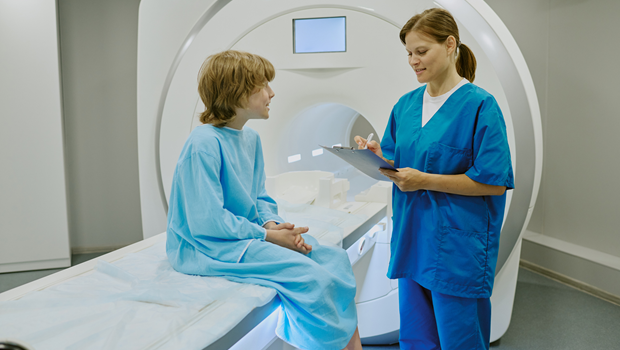 A child prepares for a CT scan